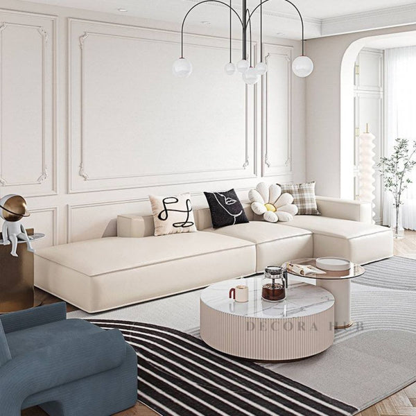 Carpet with teapoy and marble centre table styled together in an Indian living room
