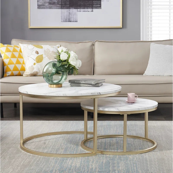 White marble top nesting table set with a gold frame