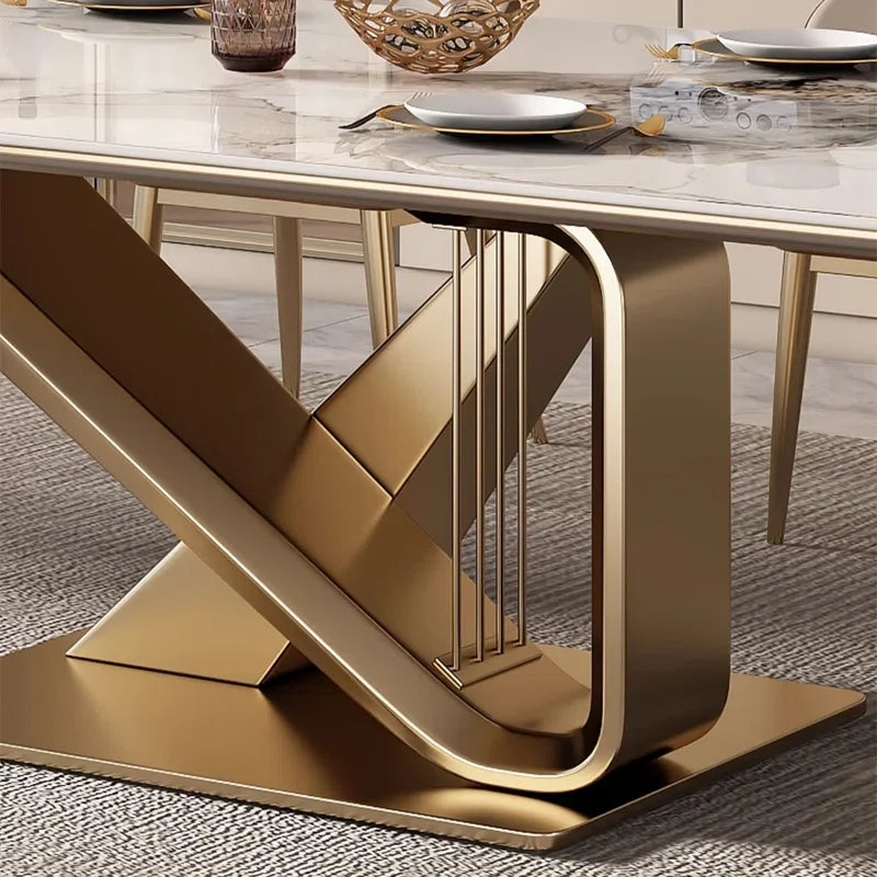 Dining table with gold metal base and marble top