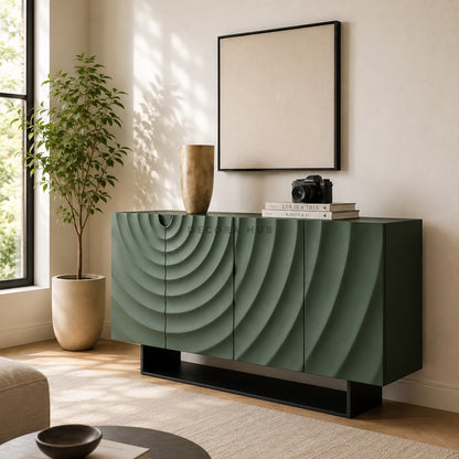 Modern green sideboard in a living room with decor items and a plant.