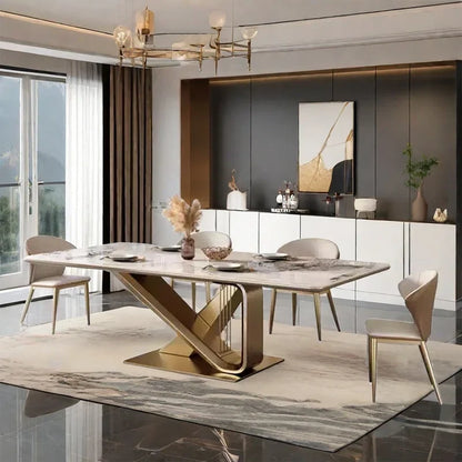 Modern dining room with a marble table and chairs in a stylish interior.