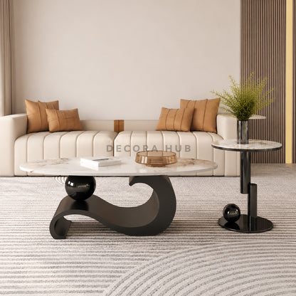 Modern living room with a beige sofa, marble coffee table, and side table.