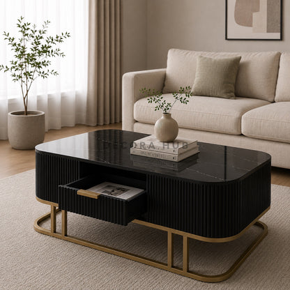 Modern living room with a black coffee table, beige sofa, and decorative elements.