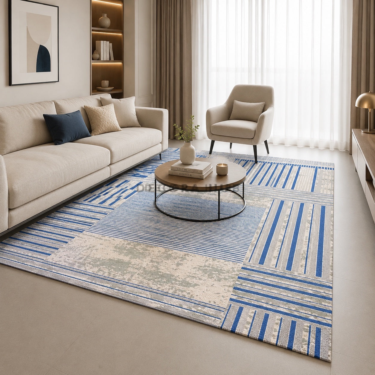 Modern living room with a blue and white patterned rug, beige sofa, and armchair.