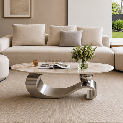 Modern living room with a beige sofa, marble coffee table, and decorative elements.