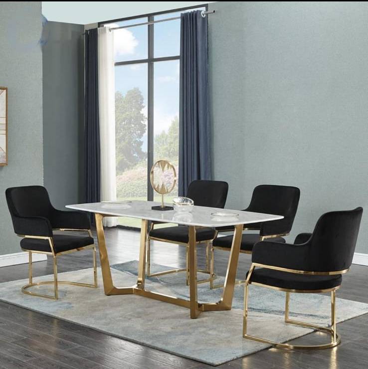 White marble dining table with golden stainless steel base