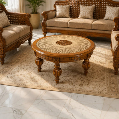 Wooden furniture set with a round table and chairs in a room.